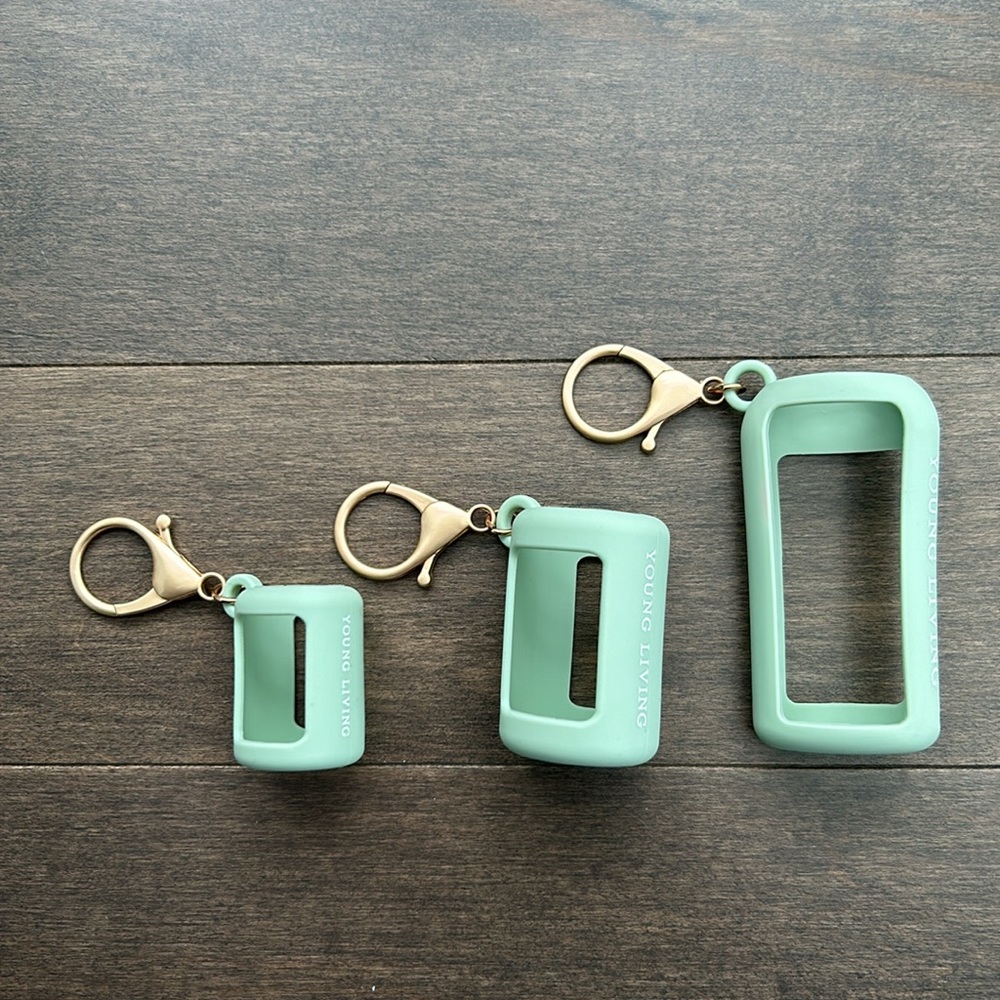 YOUNG LIVING Mint Sage Green Silicone Holders, Essential Oil, Sanitizer Travel